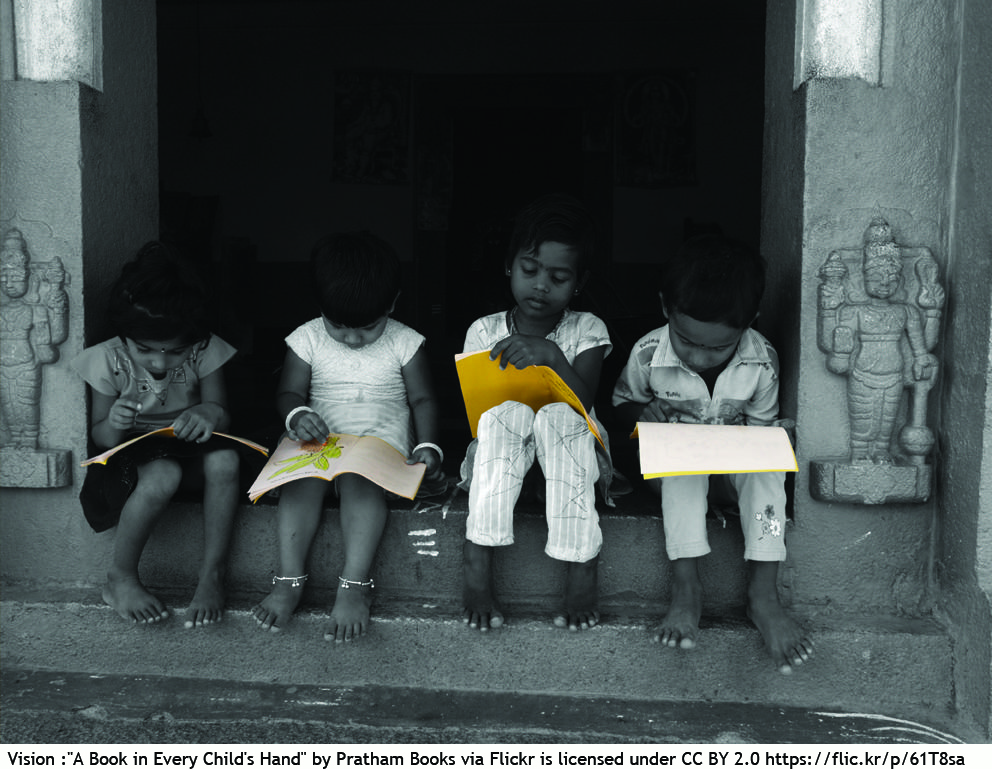 children reading foreign language books